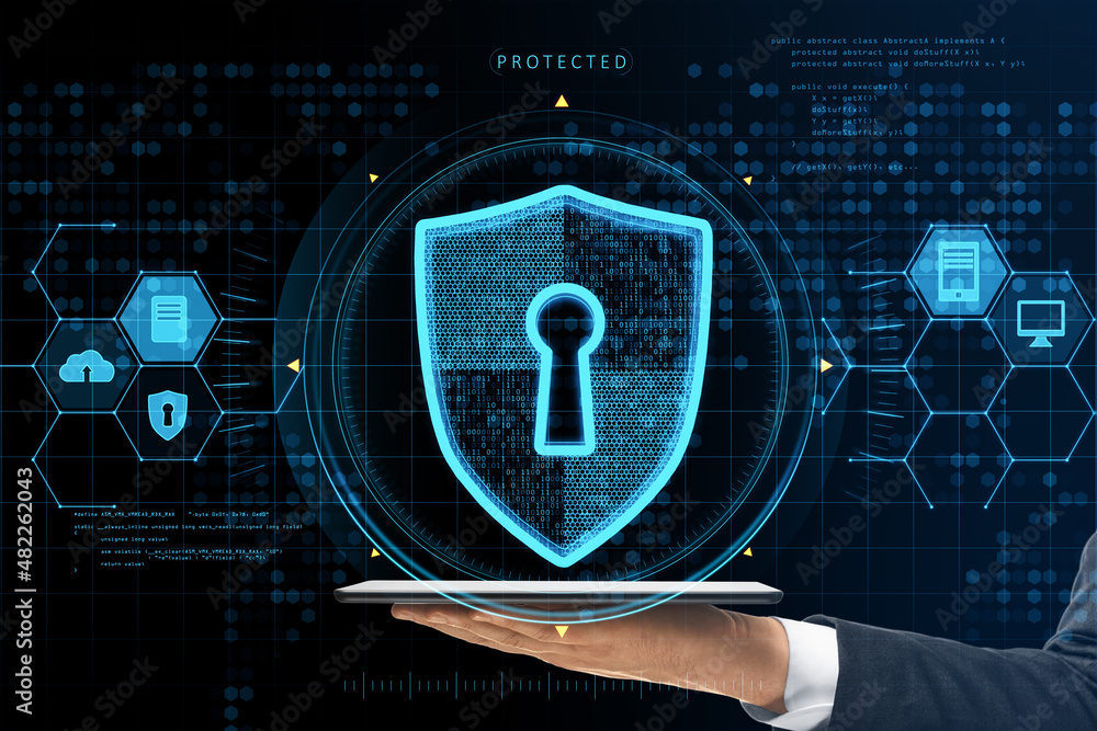Aufkleber close up of businessman hand holding tablet with abstract glowing keyhole shield interface on blurry