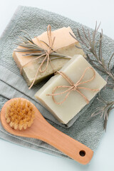 Handmade natural soap on pastel background.