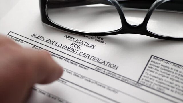 Finger tapping on application for alien employment
