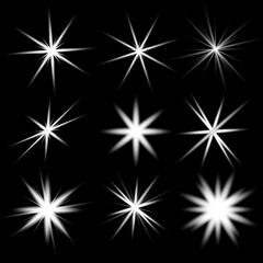 The effect of glowing lights, flares, explosion and stars. Special effect on black background