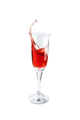 Transparent wineglass with red wine splash isolated on white background