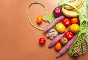 Fruits and vegetables on the table in a bag grocery shopping food deliver sustainaility concept