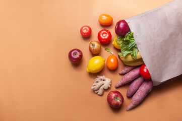 Fruits and vegetables on the table in a bag grocery shopping food deliver sustainaility concept