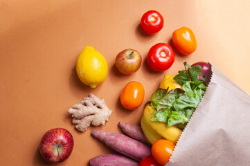 Fruits and vegetables on the table in a bag grocery shopping food deliver sustainaility concept