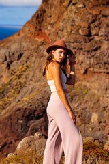 woman in a dress with a hat