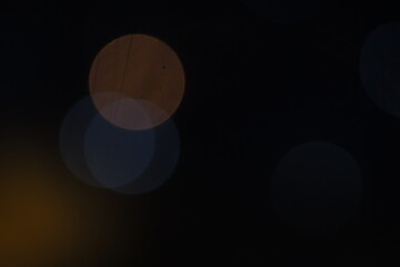 Defocused background. Bokeh abstract texture. Colorful. Circular points. Blurred bright light. 