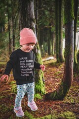 child playing in the forest 