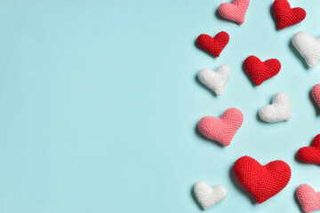 Fototapeta premium A holiday card with red hearts. Banners for Valentine's Day. Background on February 14. Space for copying. Flat position, top view