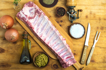 Seasoned lamb ribs ready to cook.