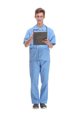Front view of happy smiling doctor writing on clipboard