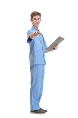 Side view of concentrated male doctor writing reports