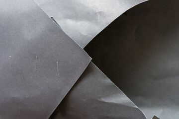 grungy gray paper envelope with staples
