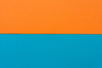 Obraz premium paper background in orange an blue