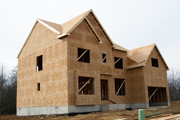 large two story family home under construction