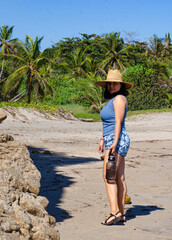 person walking on the beach
