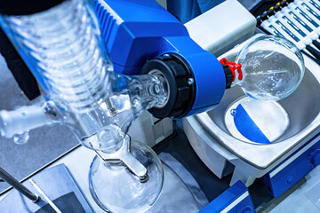 Rotary evaporator close-up. Fragment of laboratory device for evaporation. Rotary evaporator with...