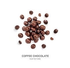 Creative layout made of coffee in chocolate in chocolate on the white background. Flat lay. Food concept.