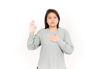 Swearing or Promise Gesture Of Beautiful Asian Woman Isolated On White Background