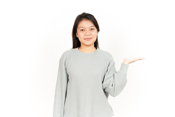 Showing Product on Open Palm Of Beautiful Asian Woman Isolated On White Background