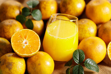 Fresh made orange juice from organic oranges in a glass
