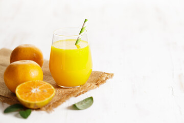 Fresh made orange juice from organic oranges in a glass