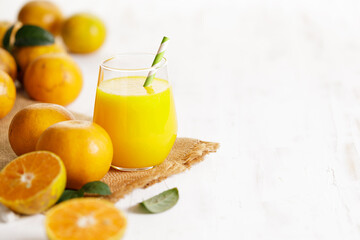Fresh made orange juice from organic oranges in a glass