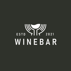 Wine bar Logo with hand holding glass of wine vector illustration logo template for wine bar or sommelier courses.