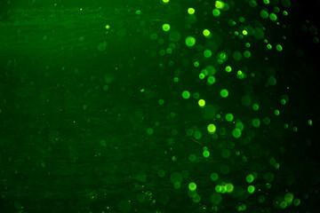Vintage green bokeh created by neon lights