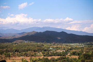 Mountain view lanscape on vast blue sky clouds,background in Mae Wang District in Chiang Mai of Thailand