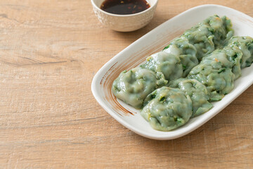 steamed chives dumplings with sauce
