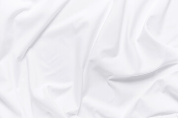 White fabric texture background. Cloth soft wave. Creases of satin, silk, and cotton.