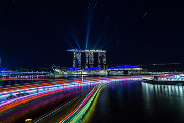 City view at Singapore central area at night with light trails.