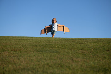 Child dreams of becoming a rocket pilot. Imagination and motivation concept.