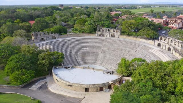 Historic Amphitheater At Altos de Chavon In La Romana, Dominican Republic. - aerial pullback