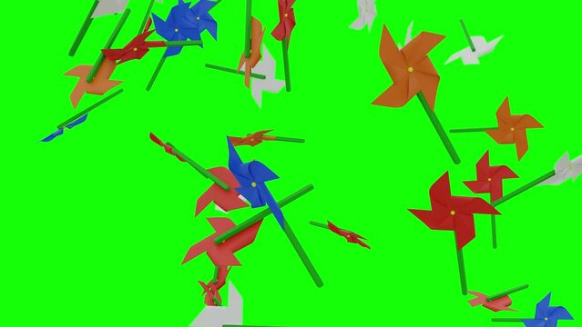 Wind Fan Toy, Colorful Fan Toy Swirling Falling On Green Screen With Alpha Matte