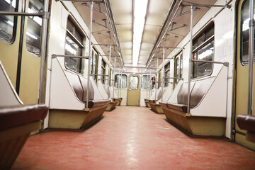 Subway car with empty seats. Empty subway.