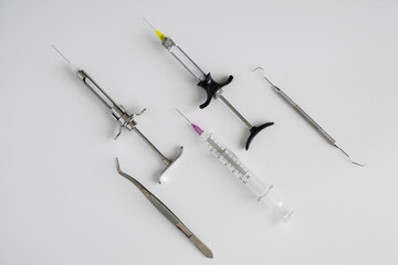 Dentistry medical tools syring on white background.