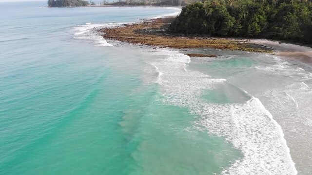 Upwards Revealing Aerial Drone Shot At Bavang Jamal Beach. Showing The Tip Of Borneo In The Background. Kudat, Malaysian Borneo