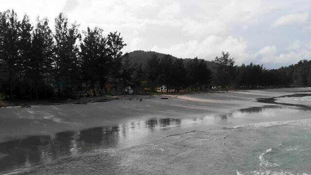 Forward Flying Aerial Drone Shot At Bavang Jamal Beach, Next To The Tip Of Borneo. Flying Over The Waves. Kudat, Malaysian Borneo