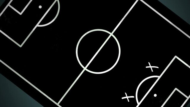 Football team strategy and play tactic on the black chalk board