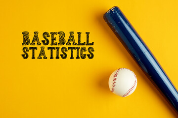 Wooden baseball bat and a ball on yellow background with the word baseball statistics