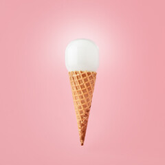 Light bulb on ice cream cone on pink background. Creativity, innovation, idea or discovery