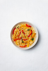 Udon noodles with chicken, pepper and sesame. Chinese food.