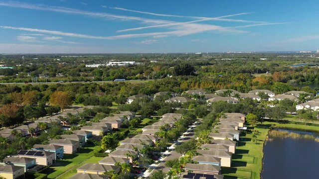 Sarasota, Florida. Peaceful suburbs estate next to lakes, near highway. Aerial view