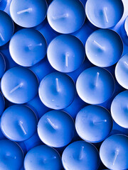 blue candles on a black background