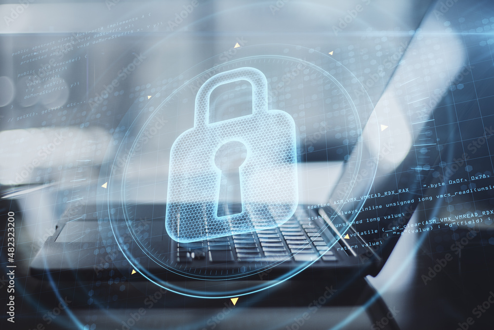 Poster close up of laptop with abstract glowing keyhole padlock interface on blurry background. protection,