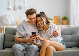 couple is using phone