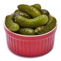 Plate of Tasty canned Whole green cornichons isolated on a white background