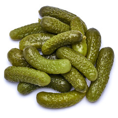 Pile of of Tasty canned Whole green cornichons isolated on a white background