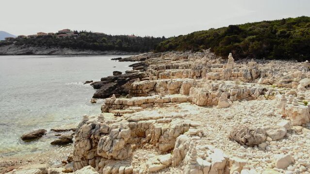 Rock Formations On Alexia Beach In Greece - aerial drone dolly shot